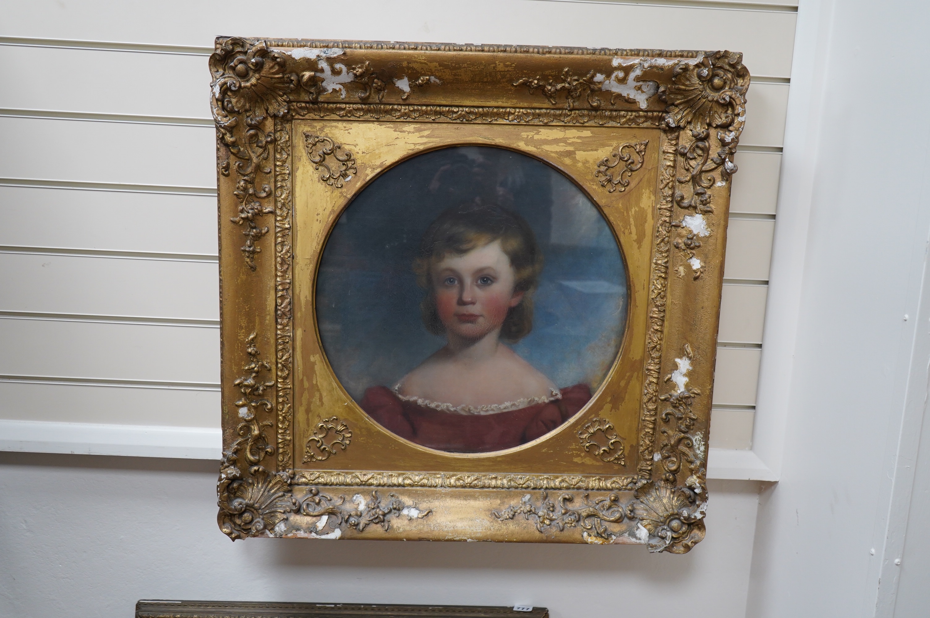 19th century English School, tondo pastel, Head and shoulders portrait of a young boy, unsigned, diameter 46cm, ornate gilt frame. Condition - poor to fair